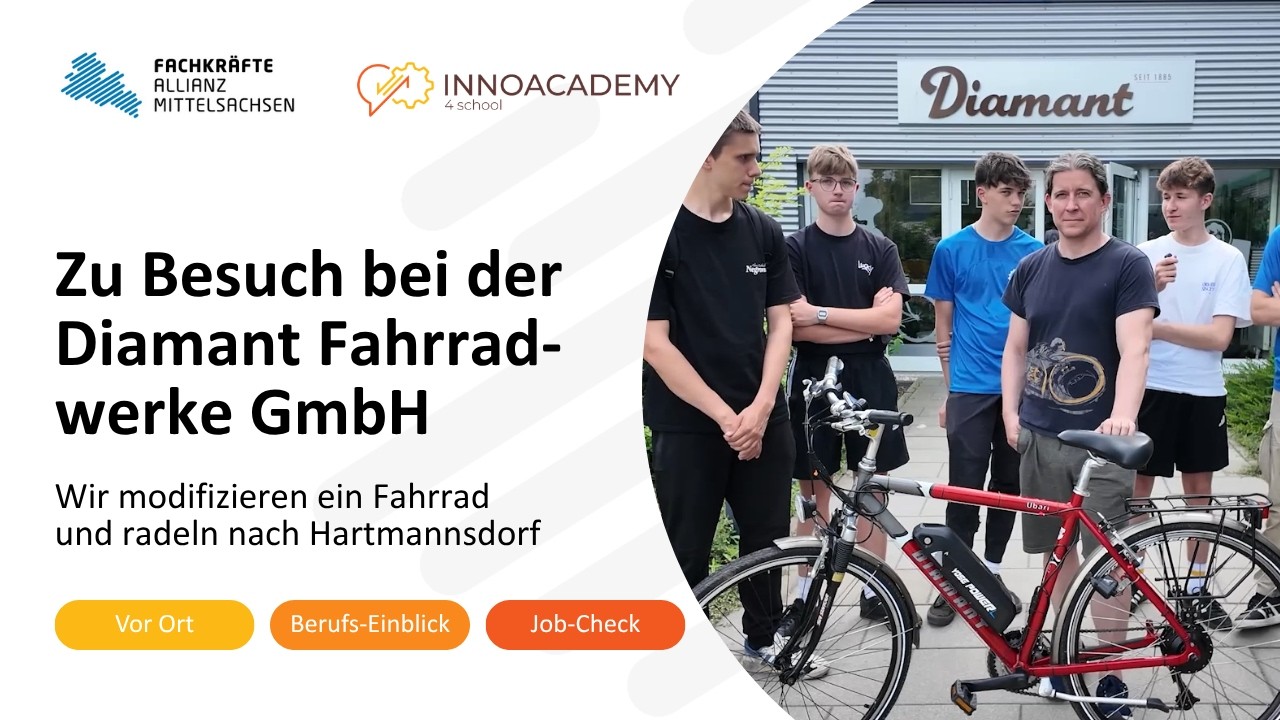 Vorschaubild zum Besuch bei Diamant: Schüler und ein Fahrrad vor dem Werk